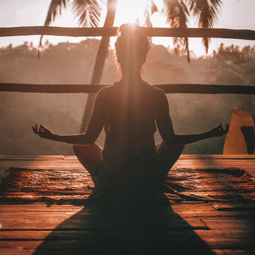 A-woman-practicing-yoga-in-the-sun