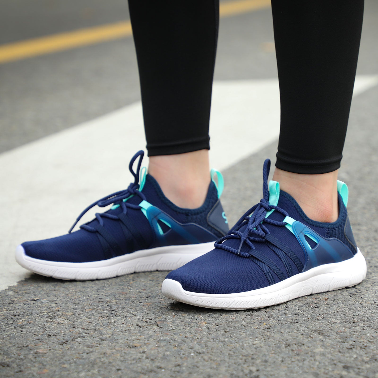 stq-fashion-sneakers-women-wearing-shoes-stand